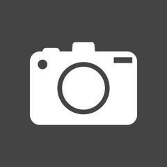 Camera icon on black background. Flat vector illustration. 
