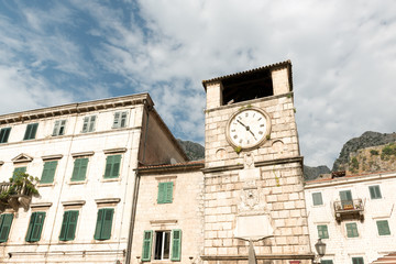 Fototapeta na wymiar Medieval Clock Tower on main Square of Arms, Kotor, Montenegro