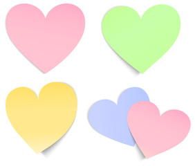 Vector heart shaped sticky papers in different colours.