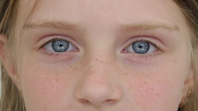Beautiful young girl indoor, portrait children close up