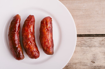 Sausage. Delicious sausages in a plate.