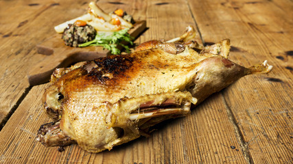 Roasted Duck On Wooden Table