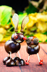 smiling chestnut figures