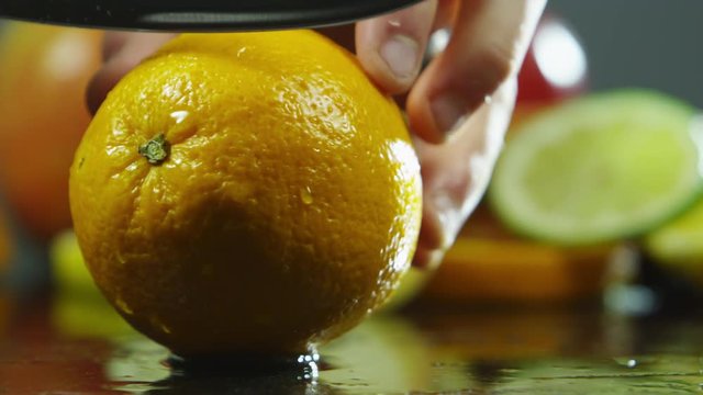 Slicing into a grapefruit