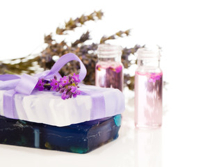Obraz na płótnie Canvas handmade lavender oil and soap with fresh lavender, on white bac
