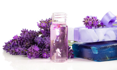Obraz na płótnie Canvas handmade lavender oil and soap with fresh lavender, on white bac