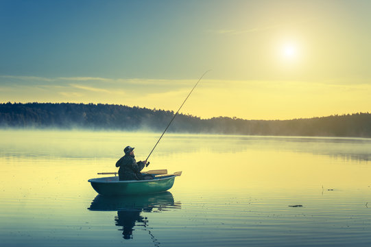 man fishes in the lakes of the Mazury