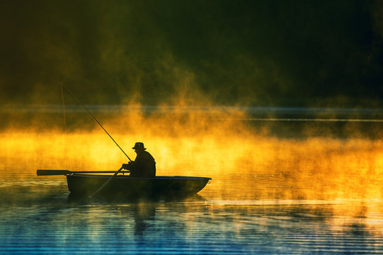 man fishes in the lakes of the Mazury