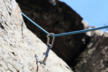 Quickdraw and rope on the rock
