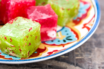 Turkish delights on wooden table

