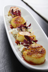 India style pan fried scallop shelfish appetizer