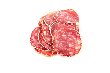 Slices of salami sausage on a white background