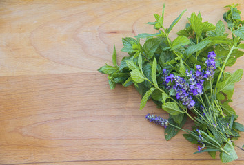 Background  mint and lavender on wooden surface