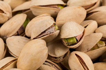Pistachio nuts arranges as background