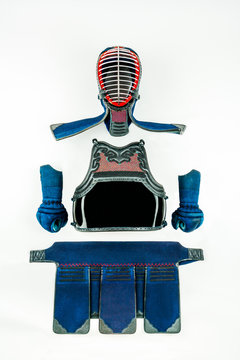 Kendo - Kendoka armor and equipment arranged and displayed on white background. 