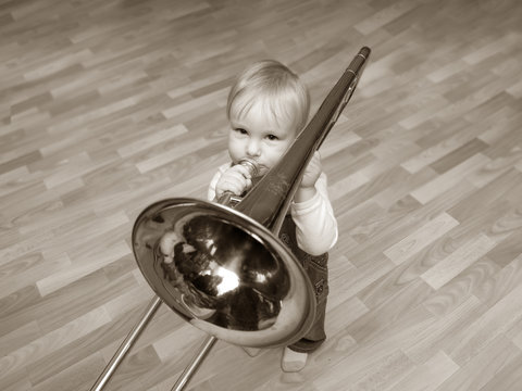 Small Child And Trombone