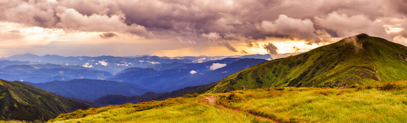 Picturesque and dramatic Carpathian mountains landscape, sunset evening time, panorama view, Ukraine.