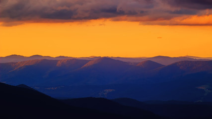 Picturesque and dramatic Carpathian mountains landscape, sunset evening time, Ukraine.