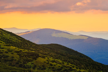 Fototapeta na wymiar Picturesque and dramatic Carpathian mountains landscape, sunset evening time, Ukraine.