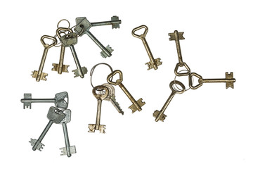 Keys sets, old and rusty. Isolation on a whiteness