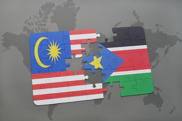 puzzle with the national flag of malaysia and south sudan on a world map background.