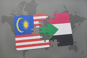 puzzle with the national flag of malaysia and sudan on a world map background.