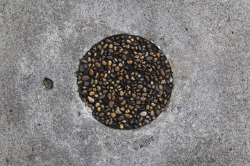Concrete floor texture with circle round stone