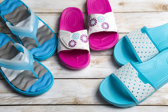 Pair of slippers on wood. Vacation in summer