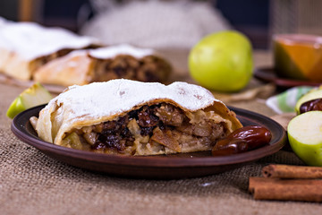 Apple strudel or apple pie  with dates and cinnamon