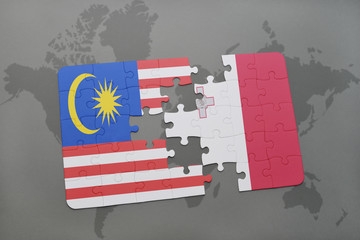 puzzle with the national flag of malaysia and malta on a world map background.