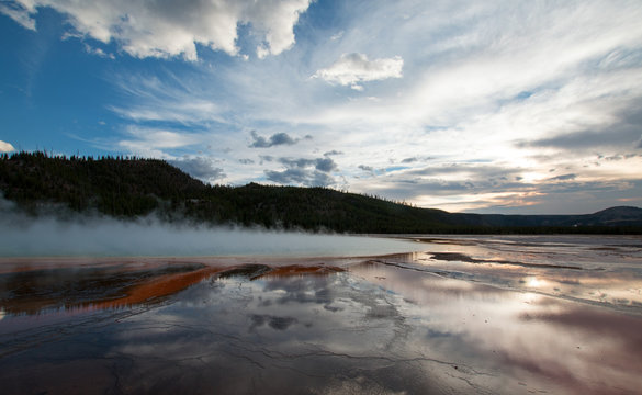 The Grand Prismatic Spring at sunset along the Firehole River in Yellowstone National Park in Wyoming USA