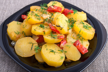 Stew of potatoes with onion, bell pepper and fennel