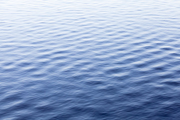 Blue sea water surface with ripple, background