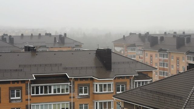 Roofs multi-storey Apartment houses covered by fog