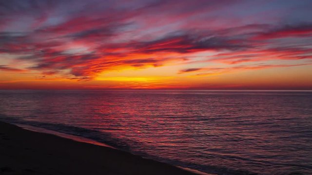 Dramatic sunset on the empty beach, Cape Cod, USA