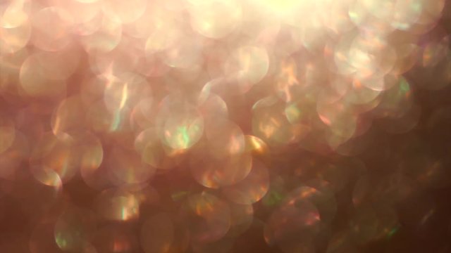 zoom in - out rose gold abstract bokeh shiny texture Background