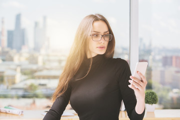 Young woman using mobile phone