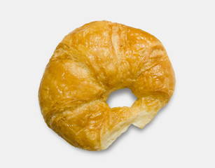 Fresh and tasty croissant over white background