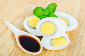 Boiled eggs and fish sauce.