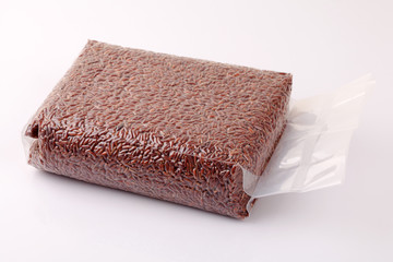 riceberry rice in a plastic vacuum bag..