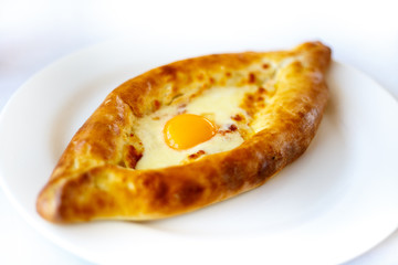 Adjarian Khachapuri on white plate