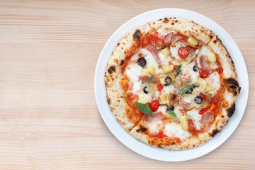 Hawaiian pizza on wood table, Top view