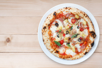 Hawaiian pizza on wood table, Top view