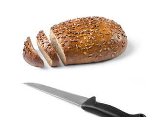 Bread with knife isolated on white background