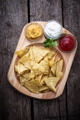 Mexican corn chips nachos with sauce