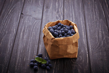 Fresh blueberries in paper bag