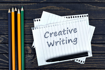Creative writing text on notepad and office tools