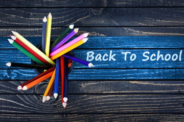 Back to school text painted and group of pencils