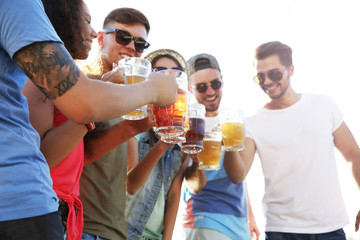 Group of friends hanging out together outdoors