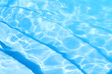 Fototapeta na wymiar Blue Water swimming pool background